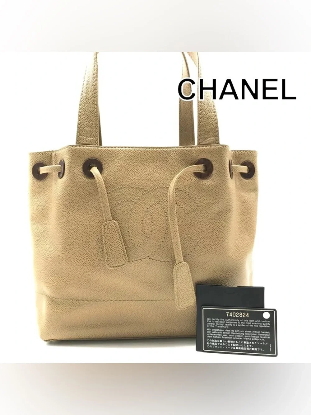 Authentic CHANEL caviar leather wood CC mini drawstring bucket bag